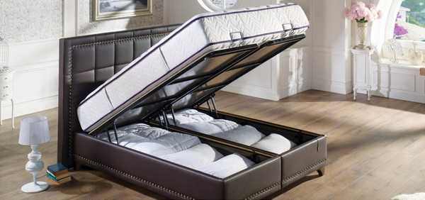 Кровать с местом для хранения постельных принадлежностей