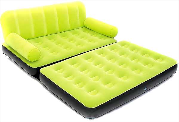 Велюровый диван-кровать зеленого цвета