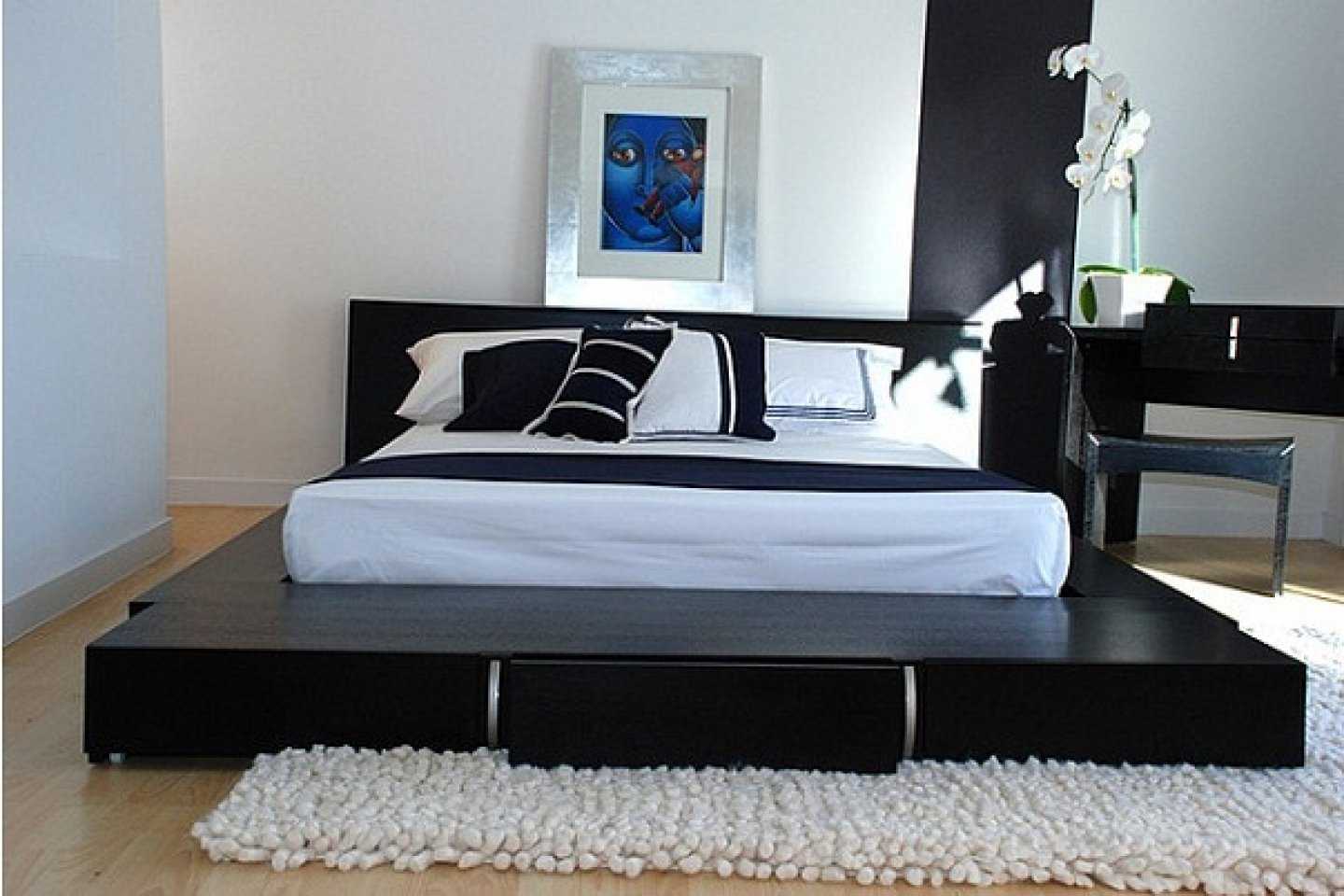 Кровать-подиум черного цвета в восточном стиле